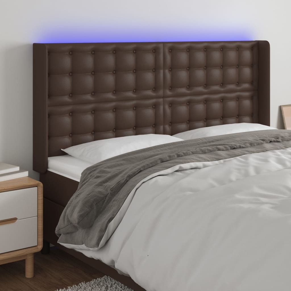 Čelo postele s LED hnědé 147 x 16 x 118/128 cm umělá kůže