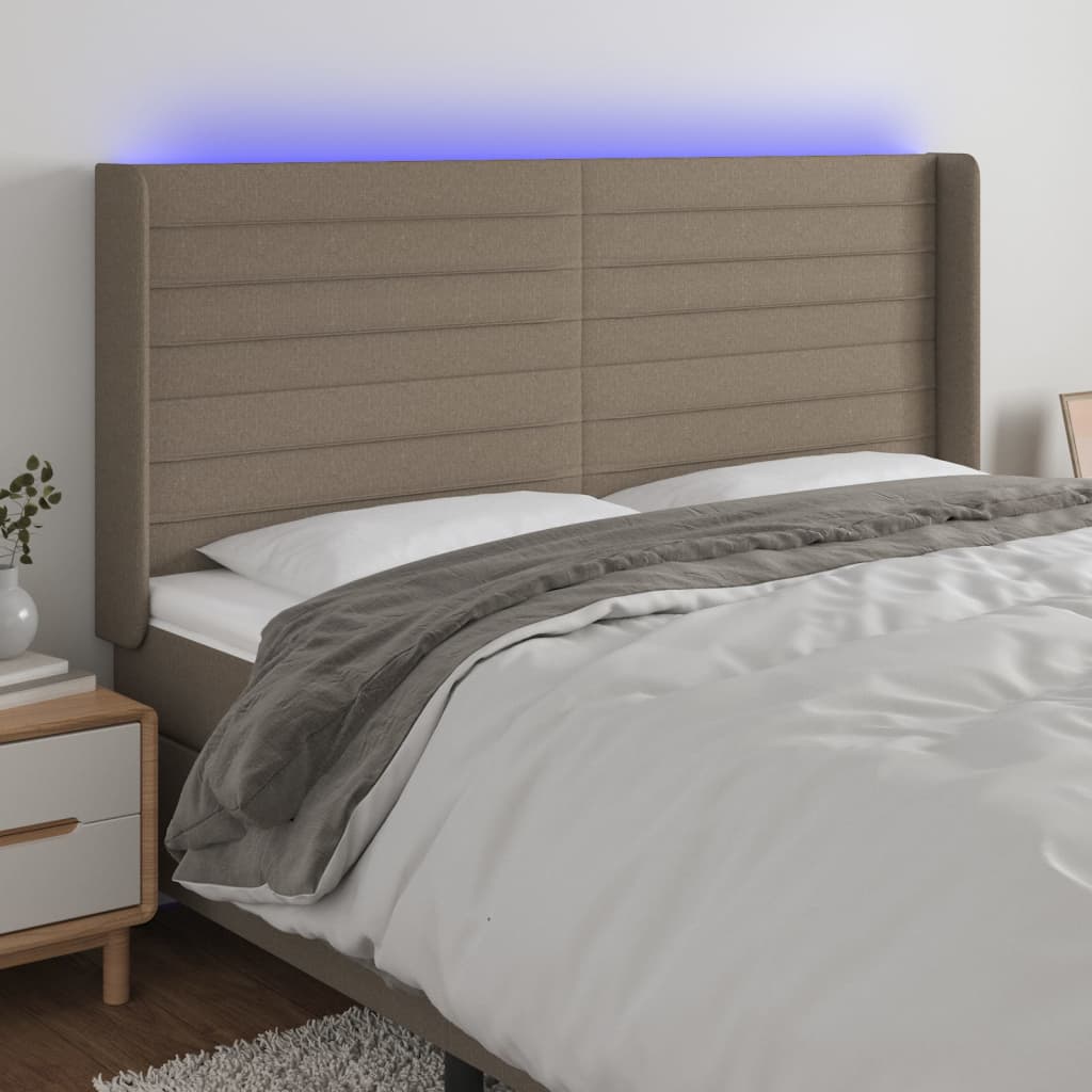Čelo postele s LED taupe 163 x 16 x 118/128 cm textil