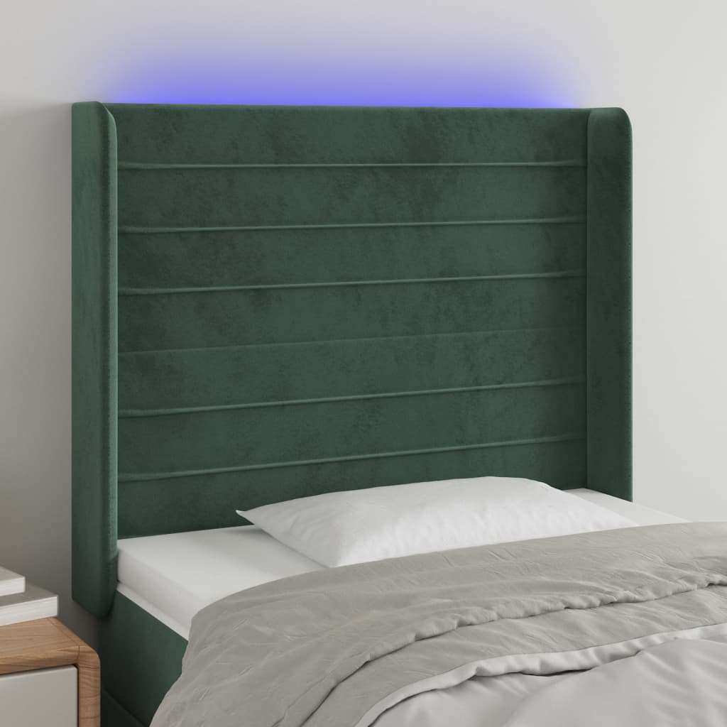 Čelo postele s LED tmavě zelené 103 x 16 x 118/128 cm samet