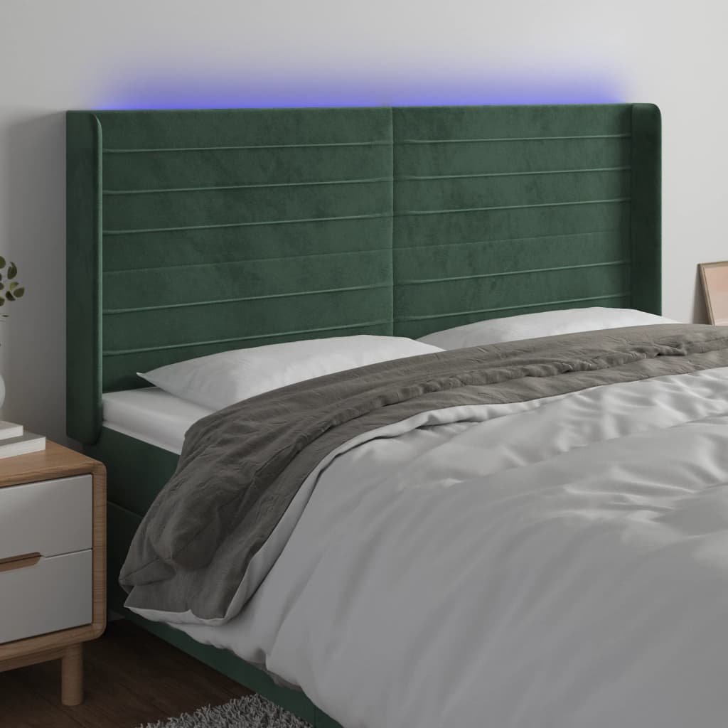 Čelo postele s LED tmavě zelené 163 x 16 x 118/128 cm samet