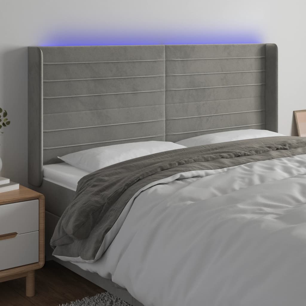 vidaXL Čelo postele s LED světle šedé 203 x 16 x 118/128 cm samet
