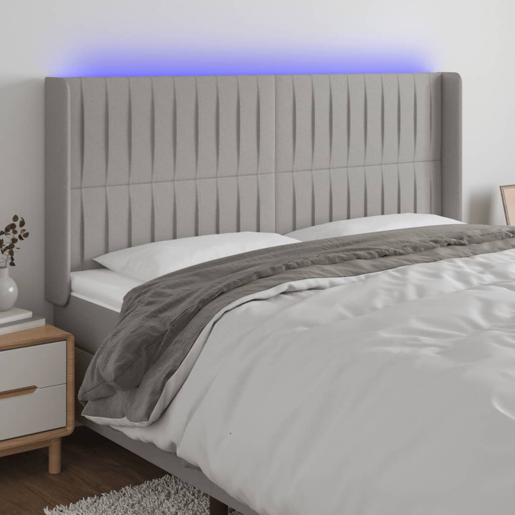 gultas galvgalis ar LED, 163x16x118/128 cm, gaiši pelēks audums | Stepinfit.lv