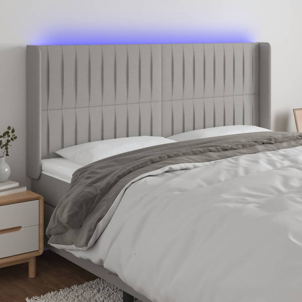 gultas galvgalis ar LED, 203x16x118/128 cm, gaiši pelēks audums | Stepinfit.lv