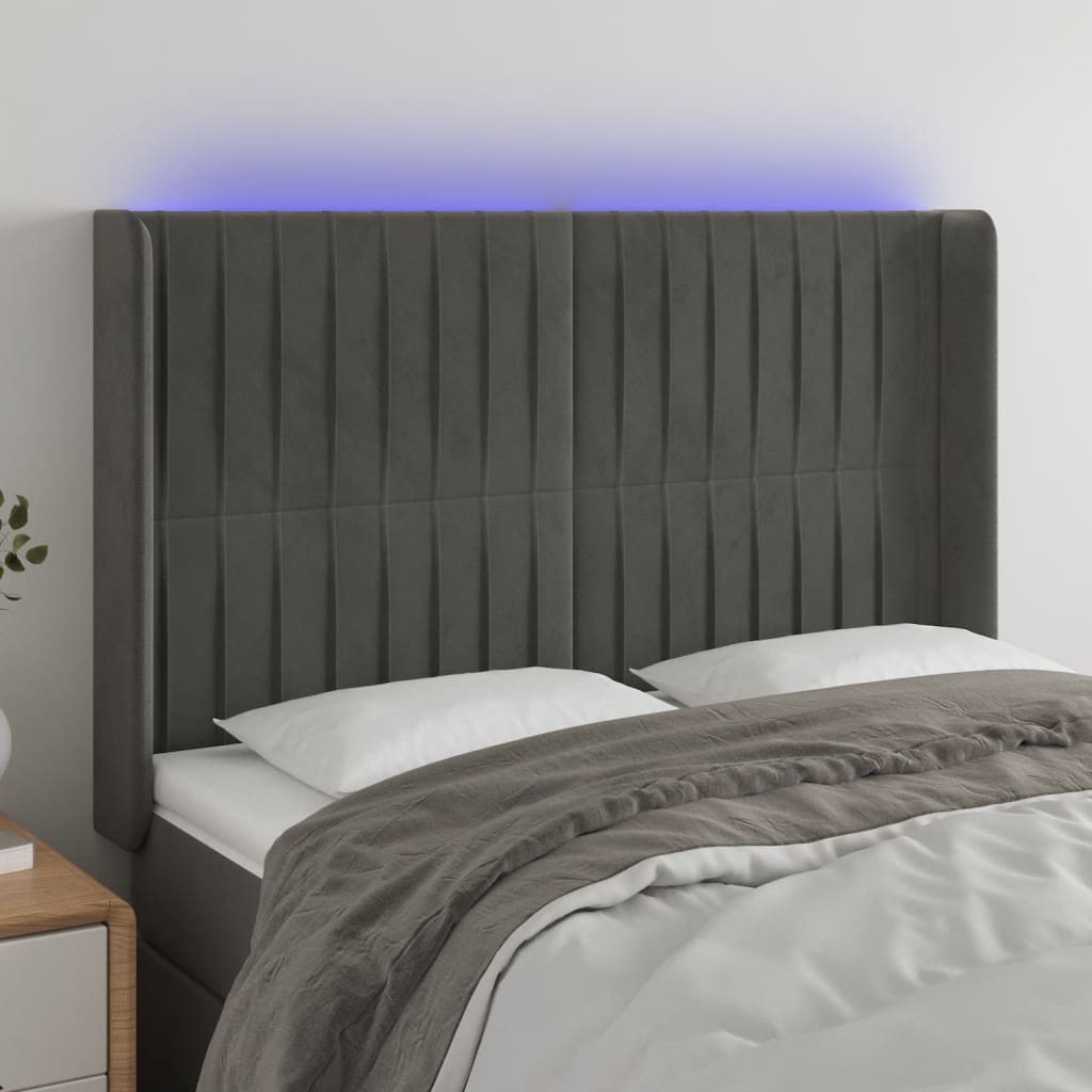Čelo postele s LED tmavě šedé 147 x 16 x 118/128 cm samet