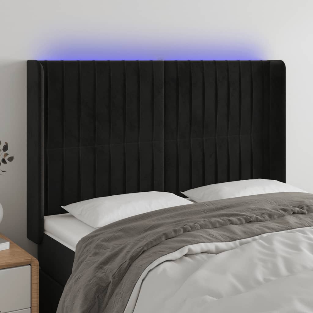 Čelo postele s LED černé 147 x 16 x 118/128 cm samet