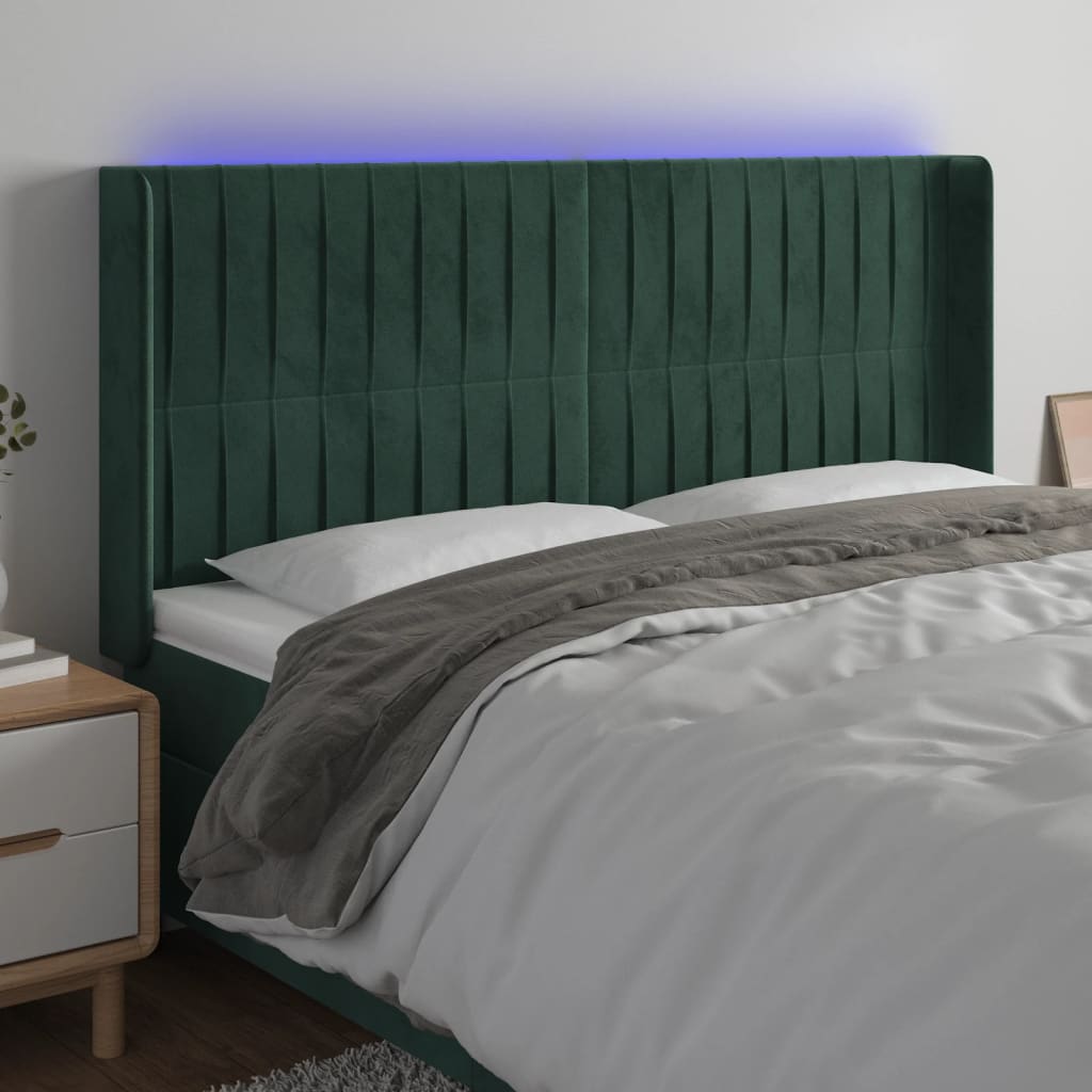 Čelo postele s LED tmavě zelené 163 x 16 x 118/128 cm samet