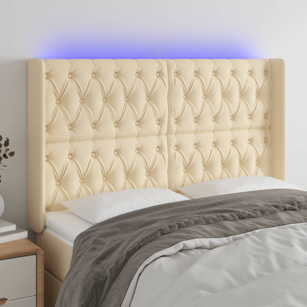 gultas galvgalis ar LED, 147x16x118/128 cm, krēmkrāsas audums | Stepinfit.lv
