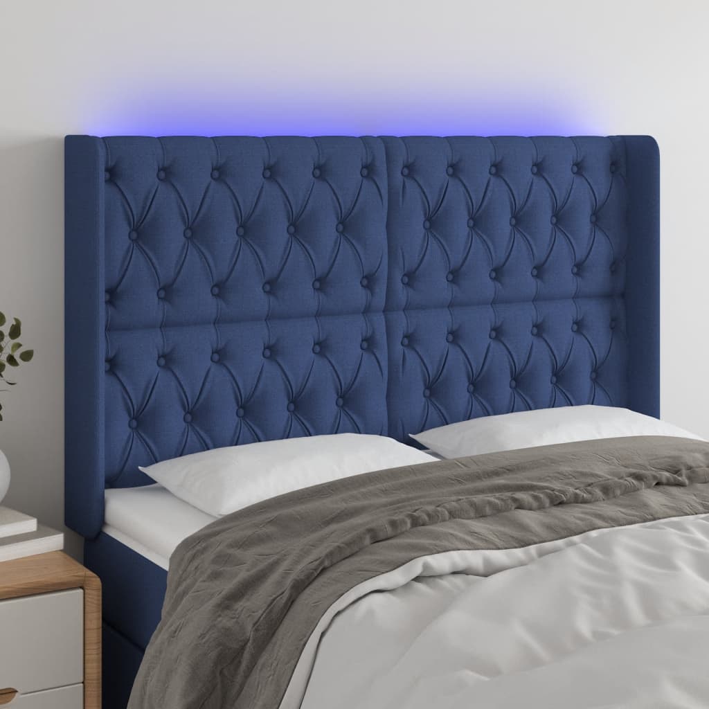 vidaXL Čelo postele s LED modré 163 x 16 x 118/128 cm textil