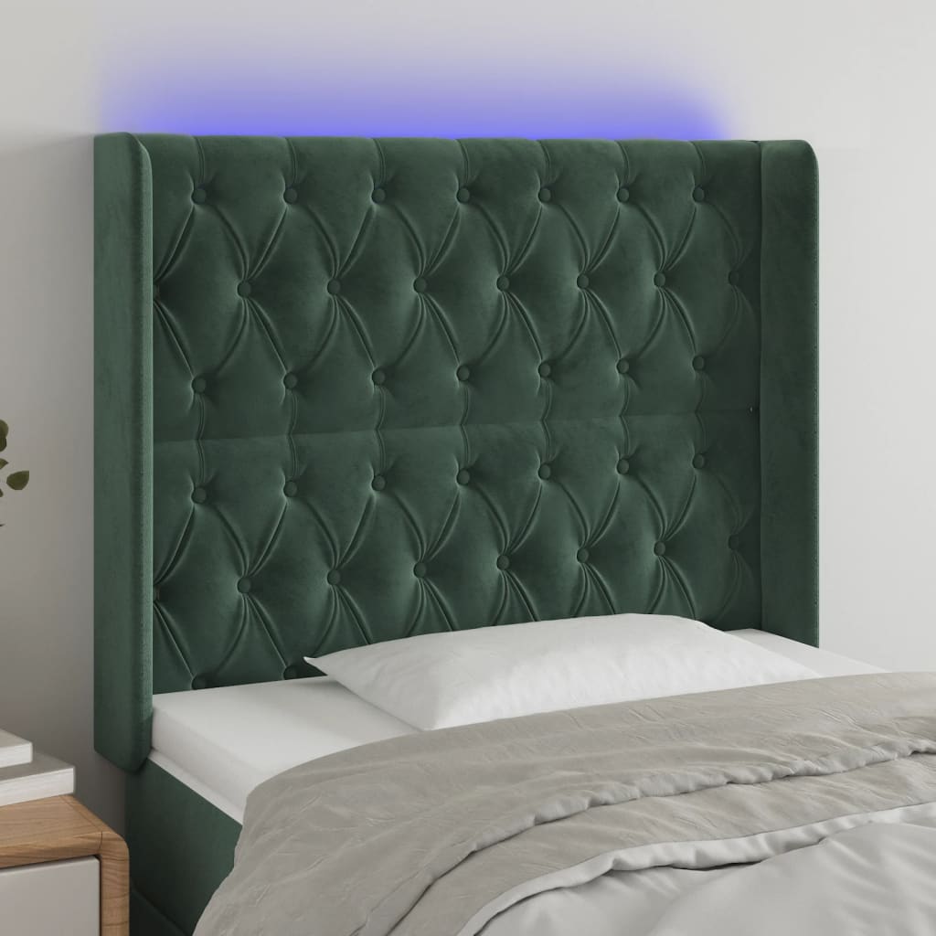 Čelo postele s LED tmavě zelené 103 x 16 x 118/128 cm samet