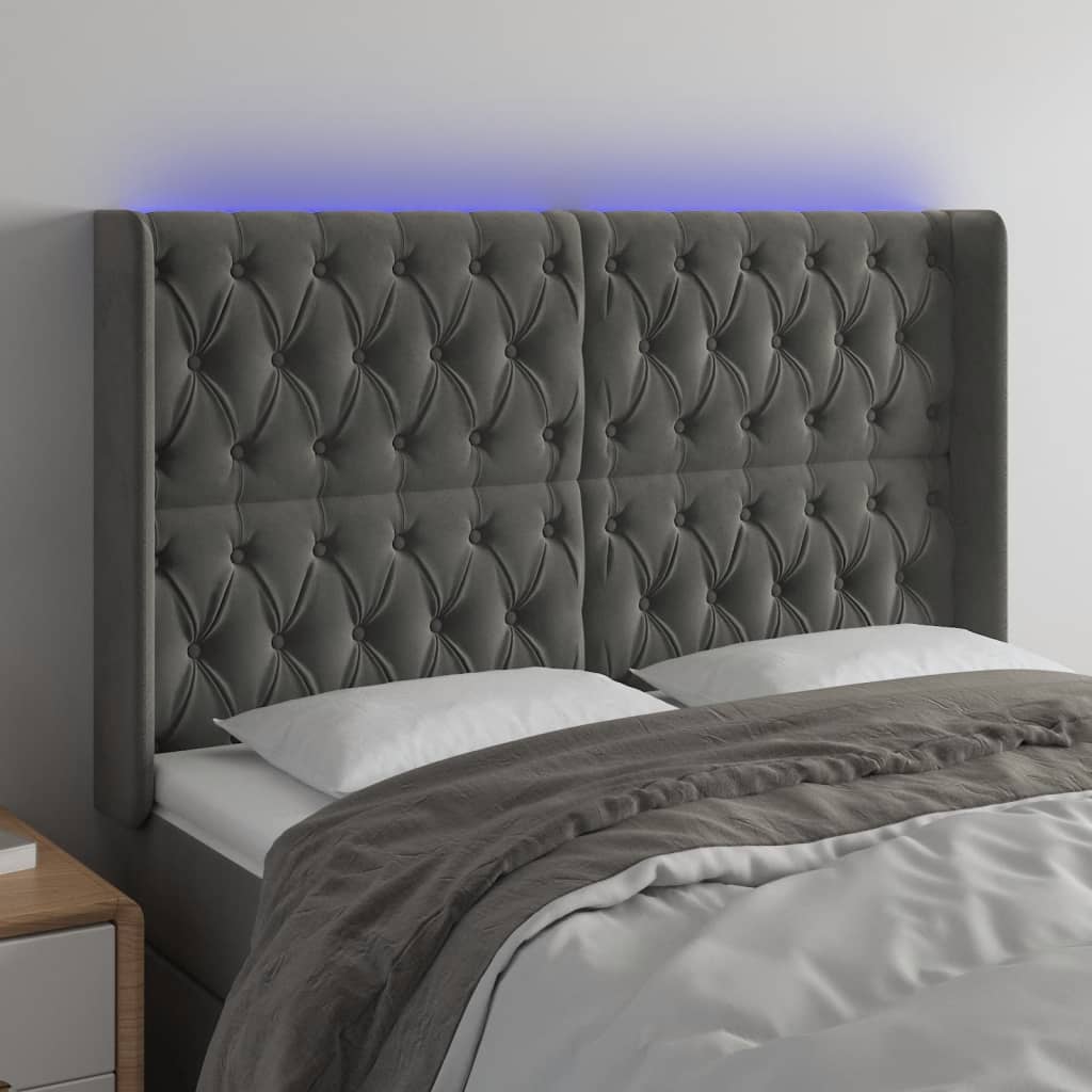 Čelo postele s LED tmavě šedé 147 x 16 x 118/128 cm samet