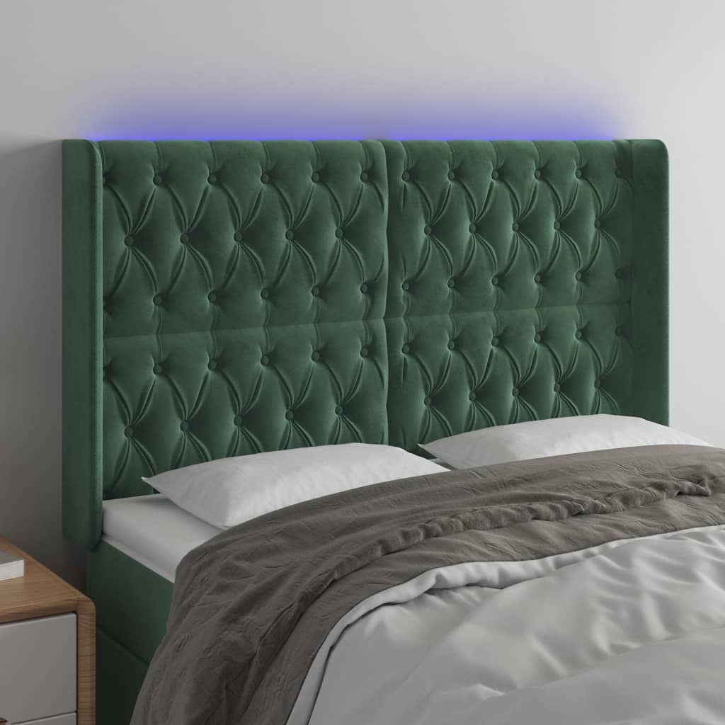 Čelo postele s LED tmavě zelené 147 x 16 x 118/128 cm samet