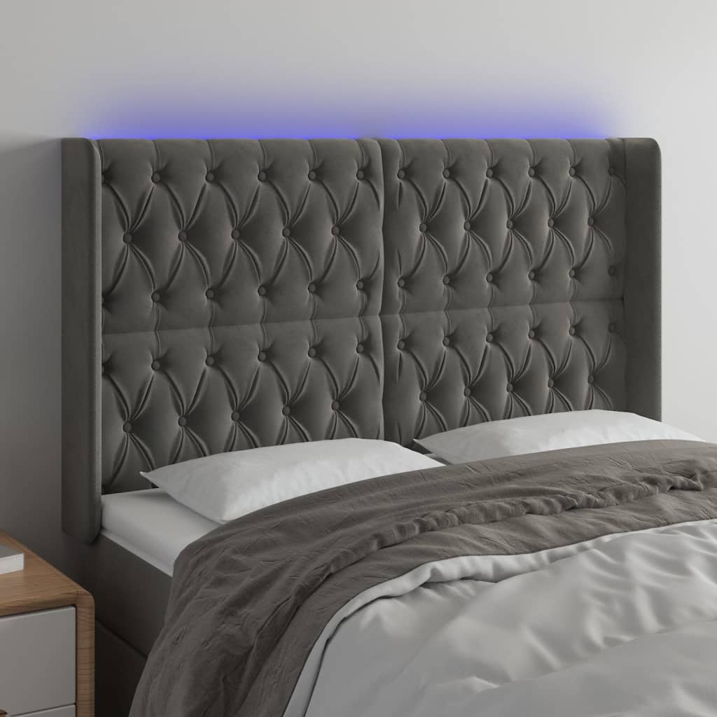 Čelo postele s LED tmavě šedé 163 x 16 x 118/128 cm samet