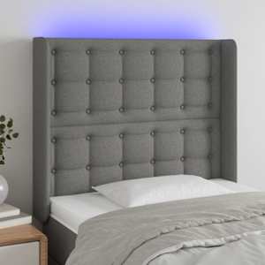 Čelo postele s LED tmavě šedé 83 x 16 x 118/128 cm textil - obrázek 1