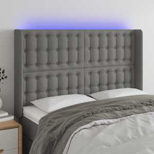 Čelo postele s LED tmavě šedé 147 x 16 x 118/128 cm textil - obrázek 1