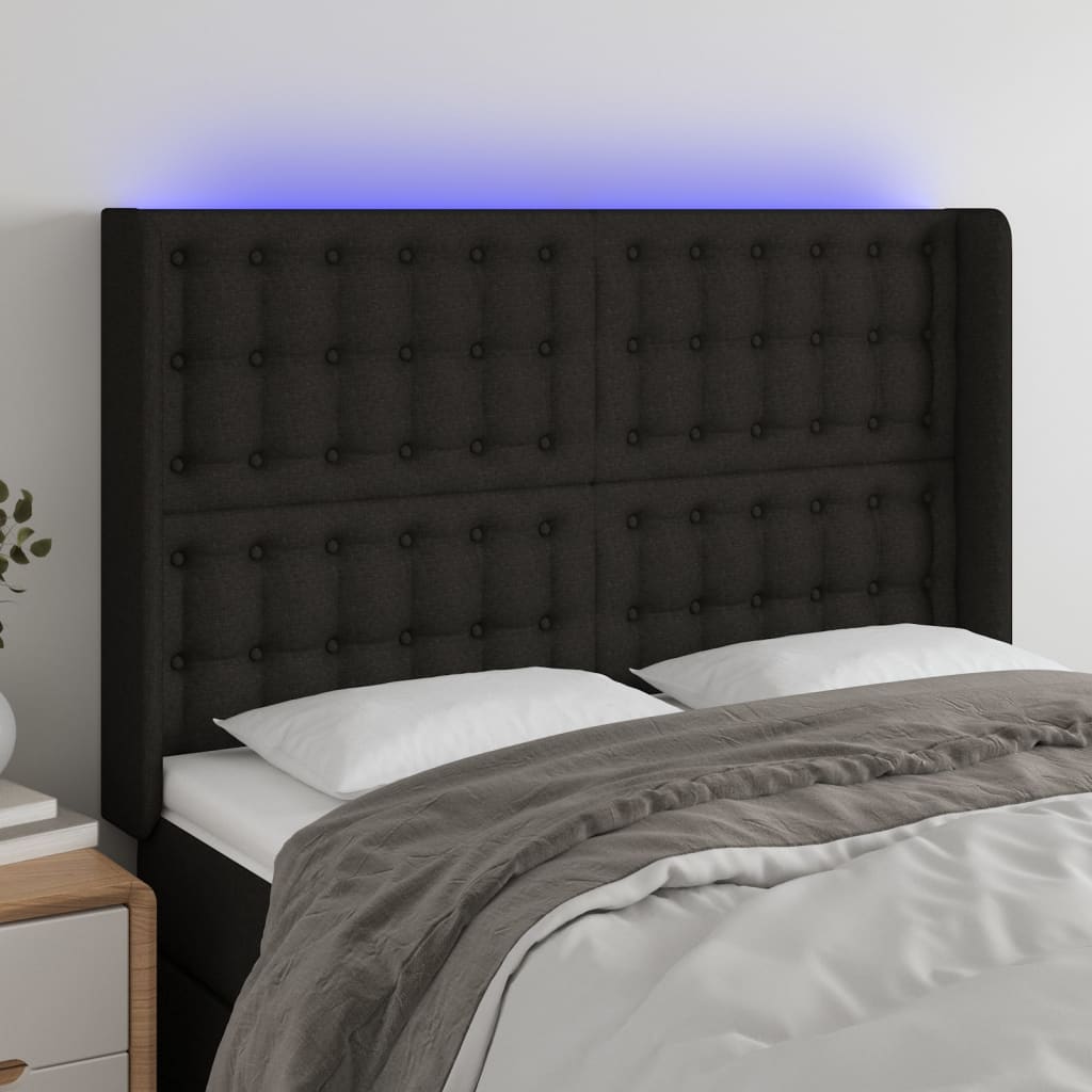 Čelo postele s LED černé 147 x 16 x 118/128 cm textil