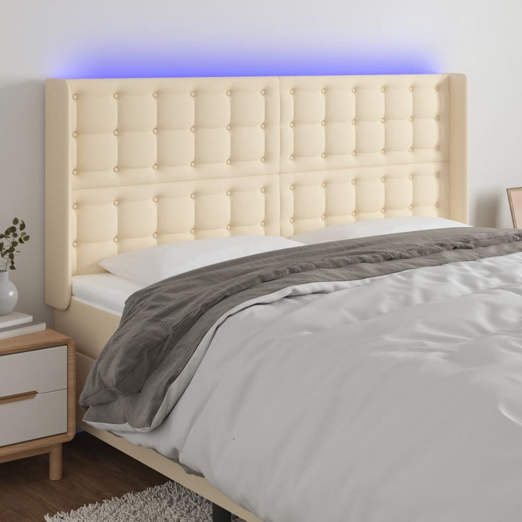 vidaXL Čelo postele s LED krémové 183 x 16 x 118/128 cm textil