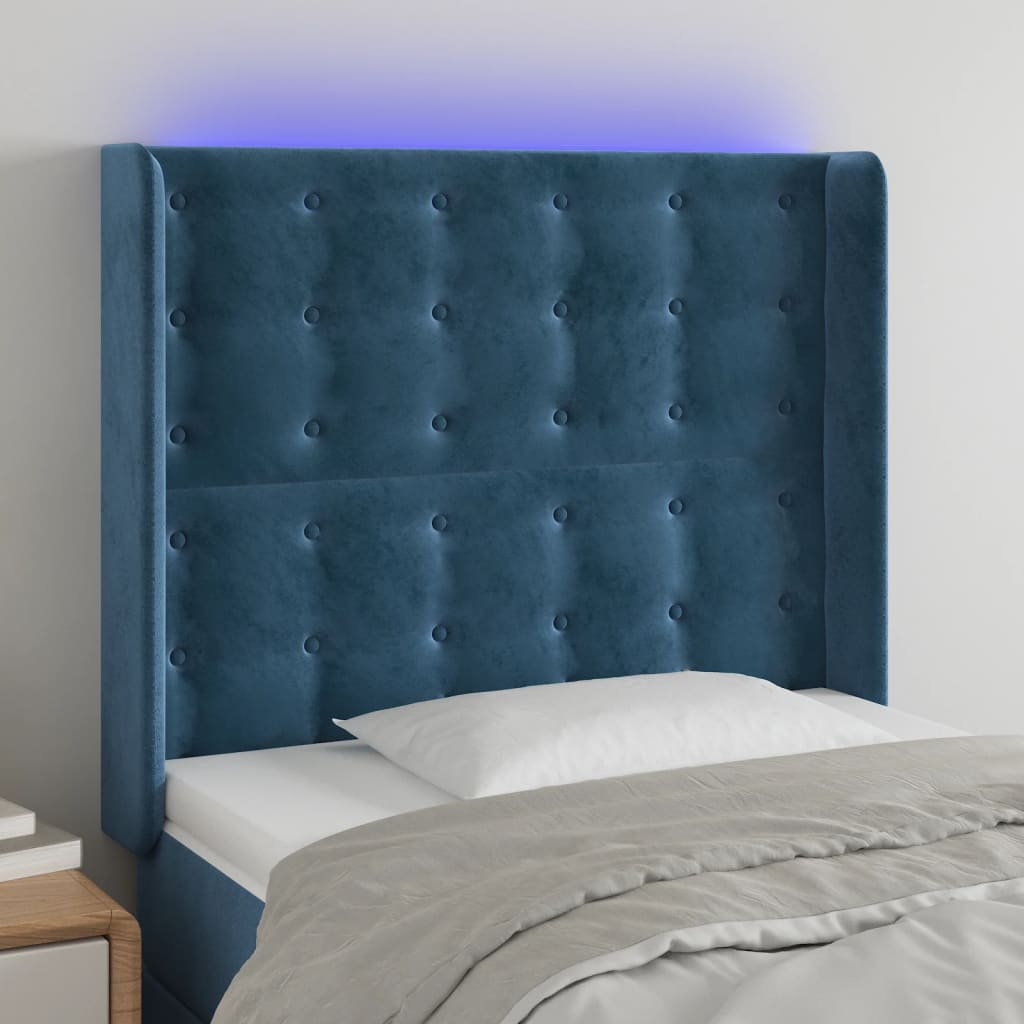 Čelo postele s LED tmavě modré 83 x 16 x 118/128 cm samet