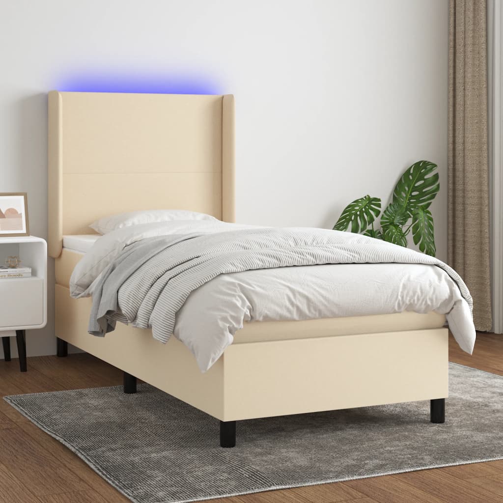 Box spring postel s matrací a LED krémová 90x190 cm textil