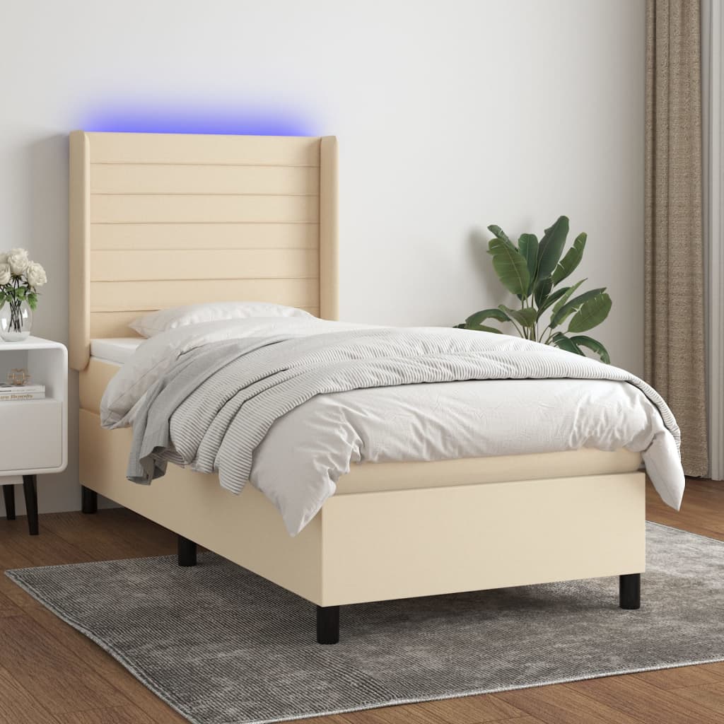 Box spring postel s matrací a LED krémová 90x190 cm textil