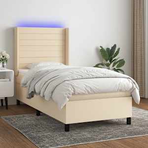 Box spring postelja z vzmetnico LED krem 90x200 cm blago