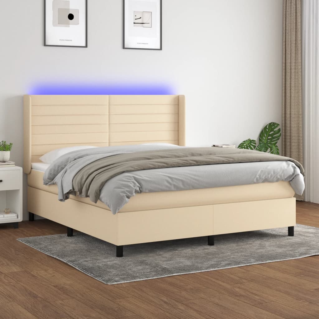 Box spring postel s matrací a LED krémová 180x200 cm textil