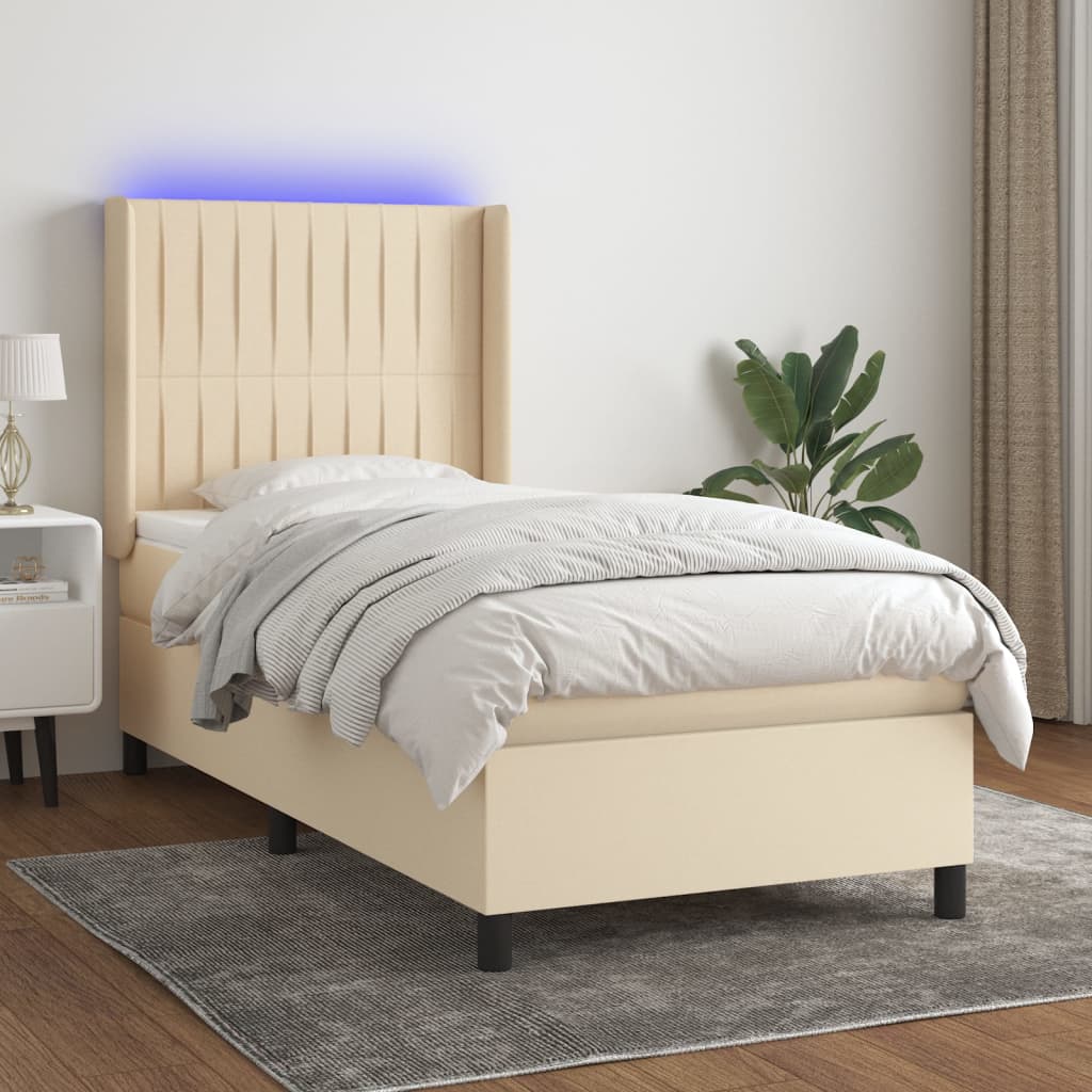 Box spring postel s matrací a LED krémová 90x190 cm textil