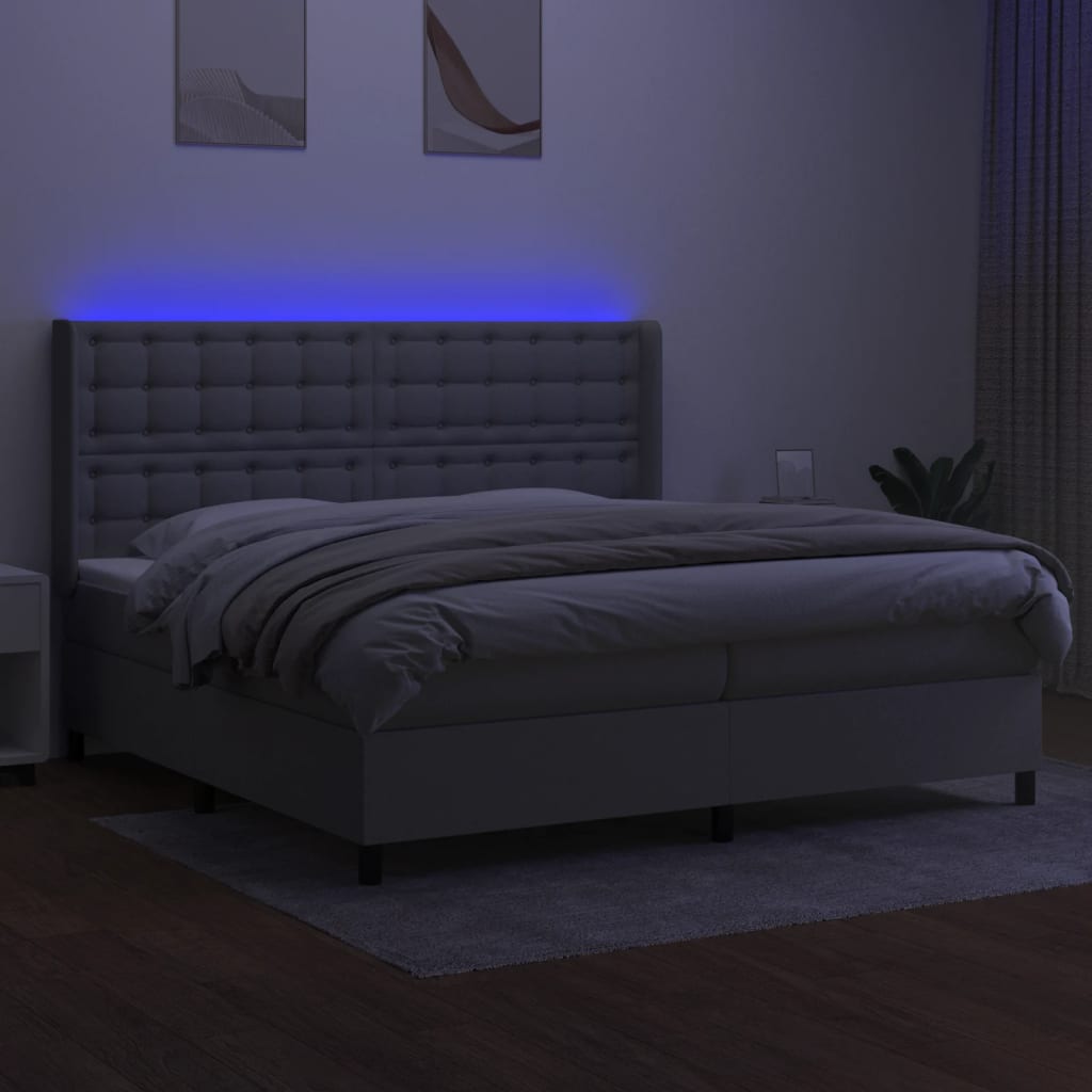 Box spring postelja z vzmetnico LED sv. siva 200x200 cm blago