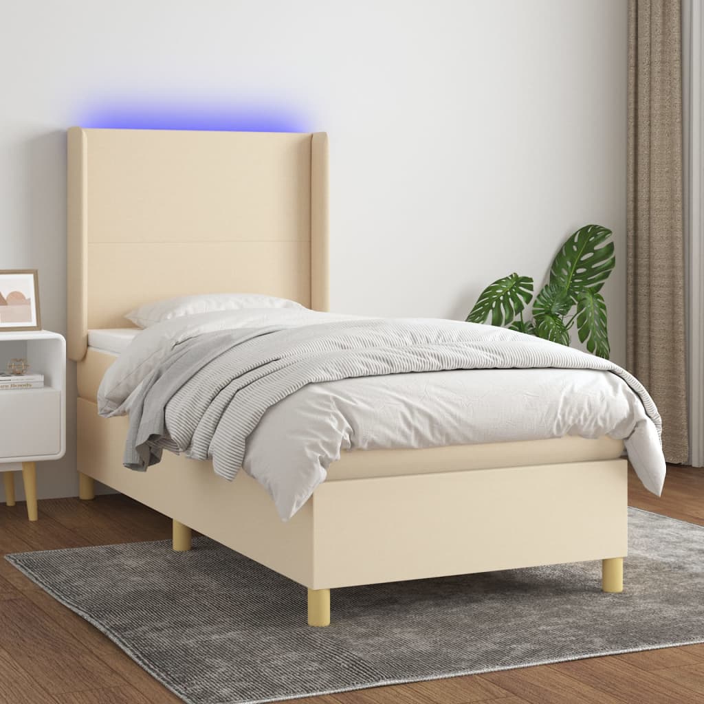 Box spring postel s matrací a LED krémová 90x190 cm textil