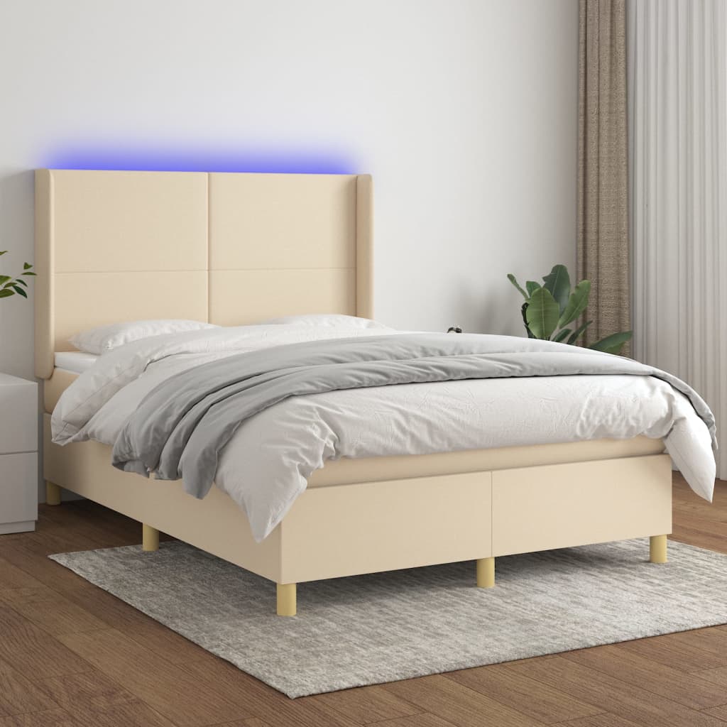 Box spring postel s matrací a LED krémová 140x200 cm textil