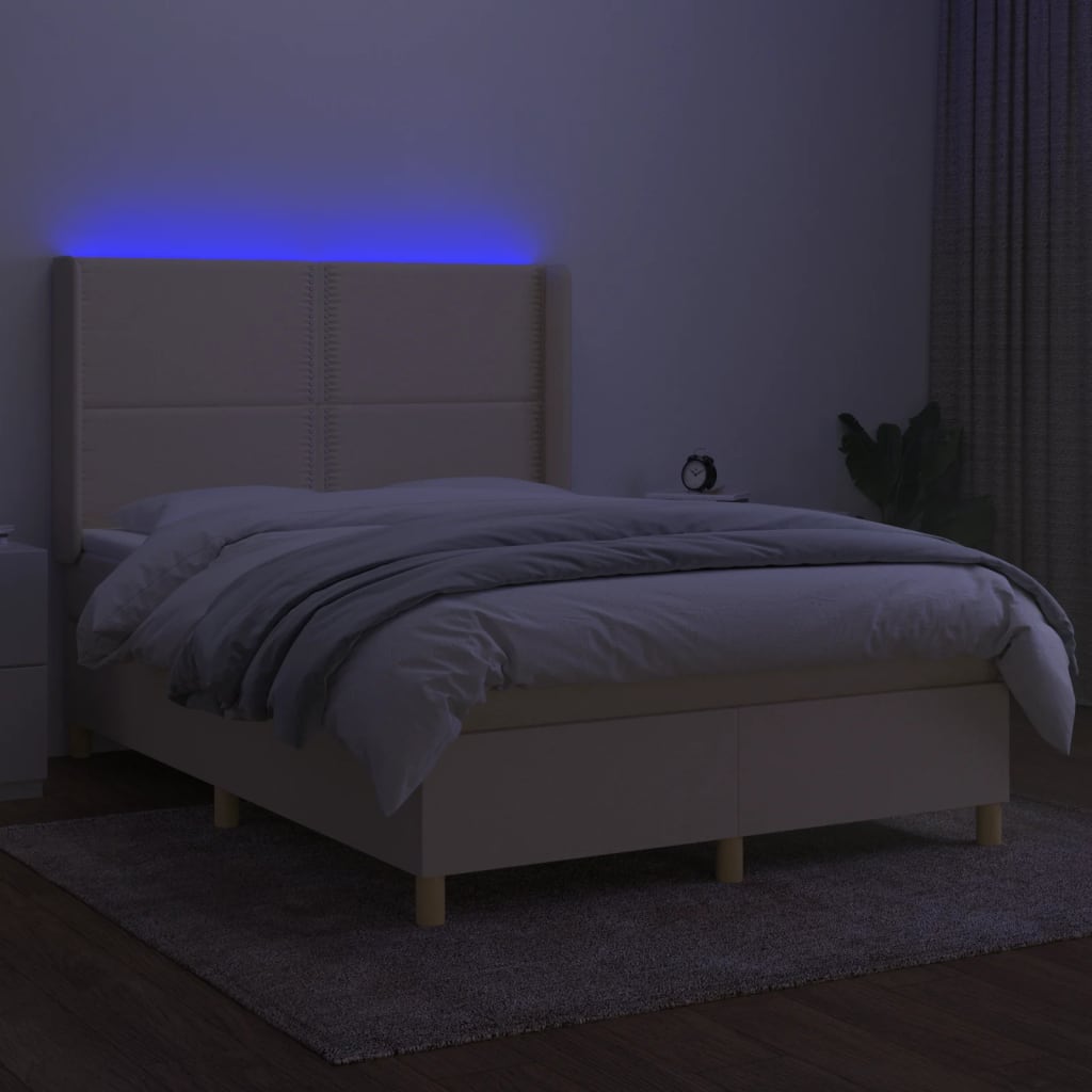 Box spring postelja z vzmetnico LED krem 140x200 cm blago