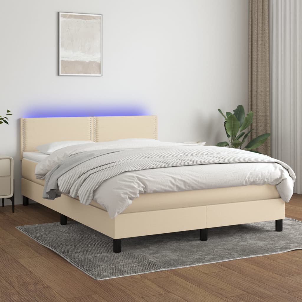 Box spring postel s matrací a LED krémová 140x200 cm textil