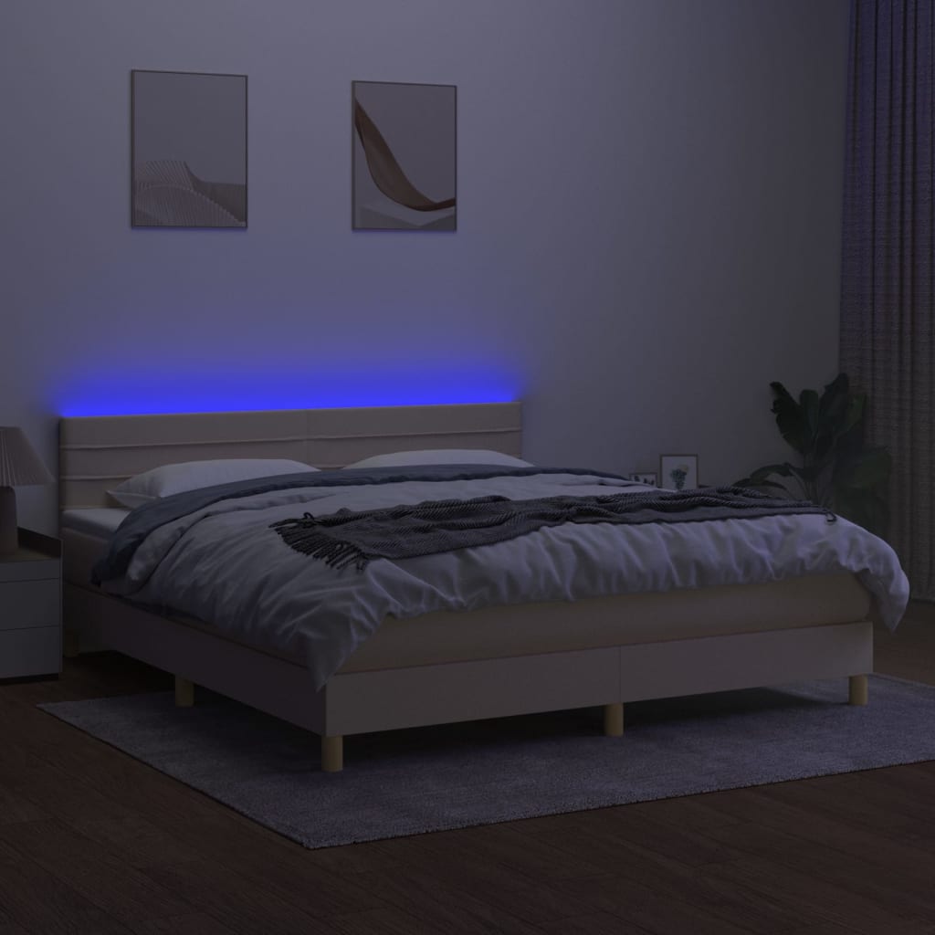 Box spring postel s matrací a LED krémová 180x200 cm textil