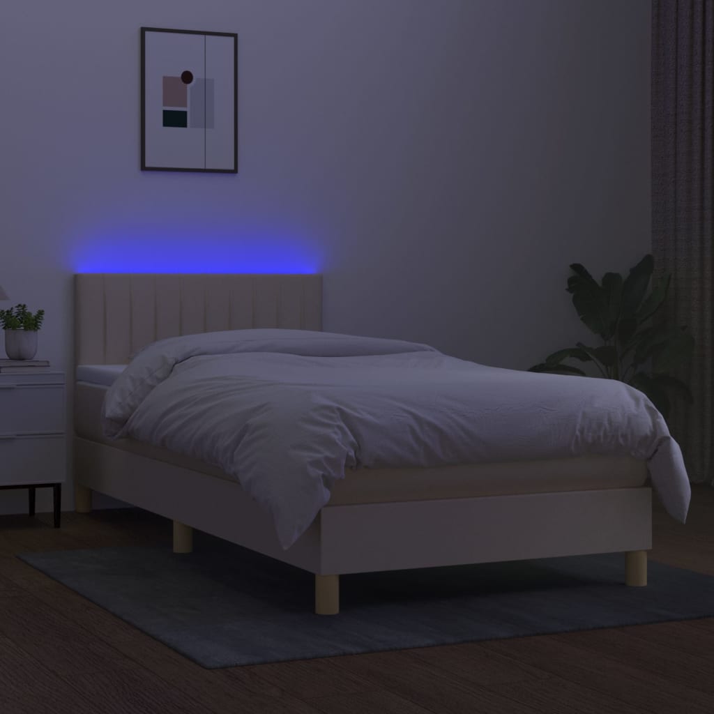 Box spring postel s matrací a LED krémová 90x190 cm textil