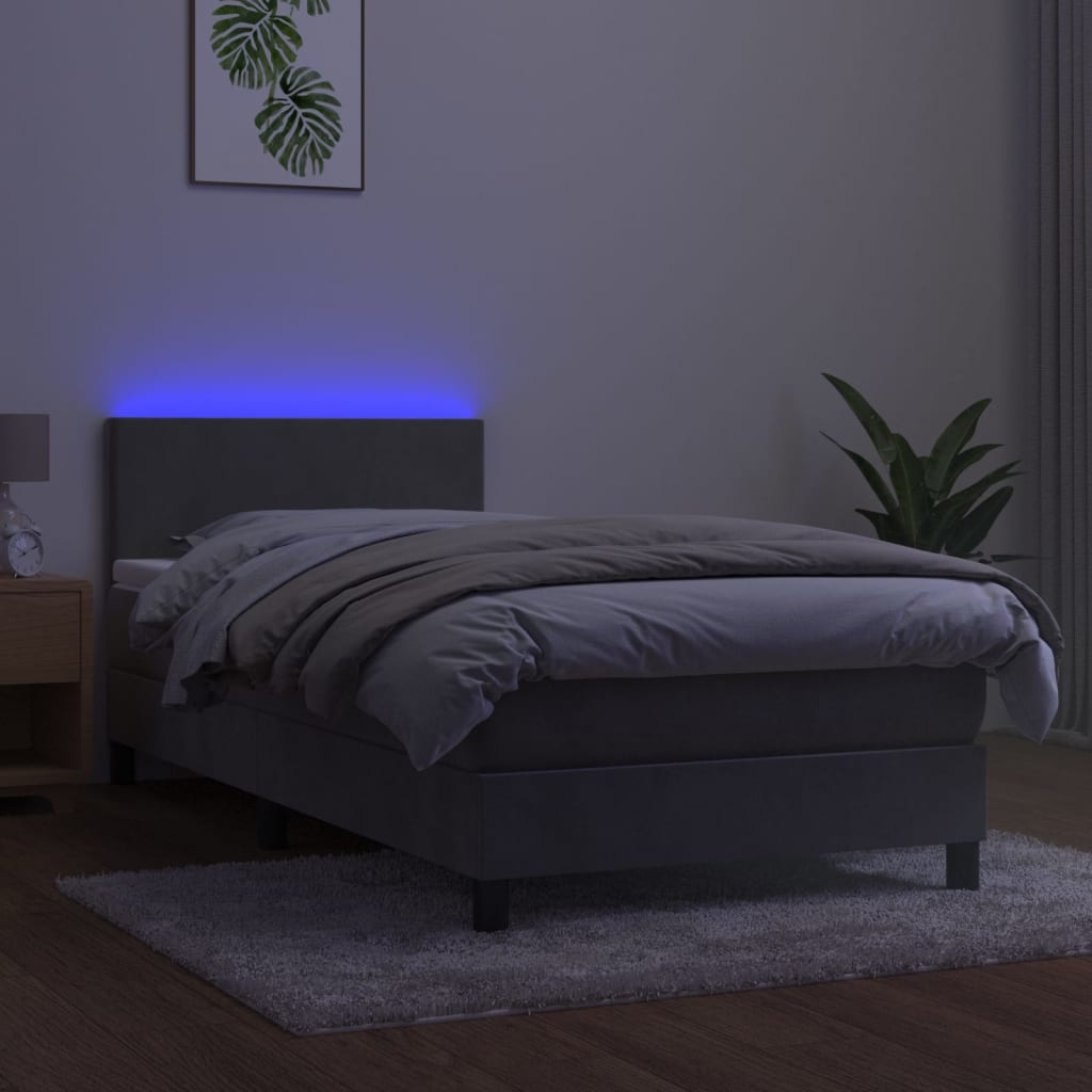 Box spring postel s matrací a LED světle šedá 90x190 cm samet