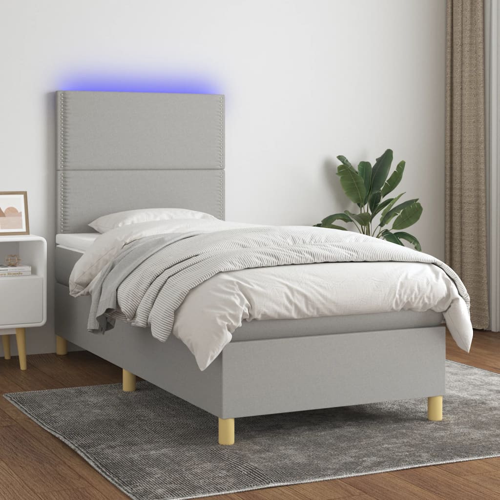 Világosszürke szövet rugós és LED-es ágy matraccal 90x190 cm 