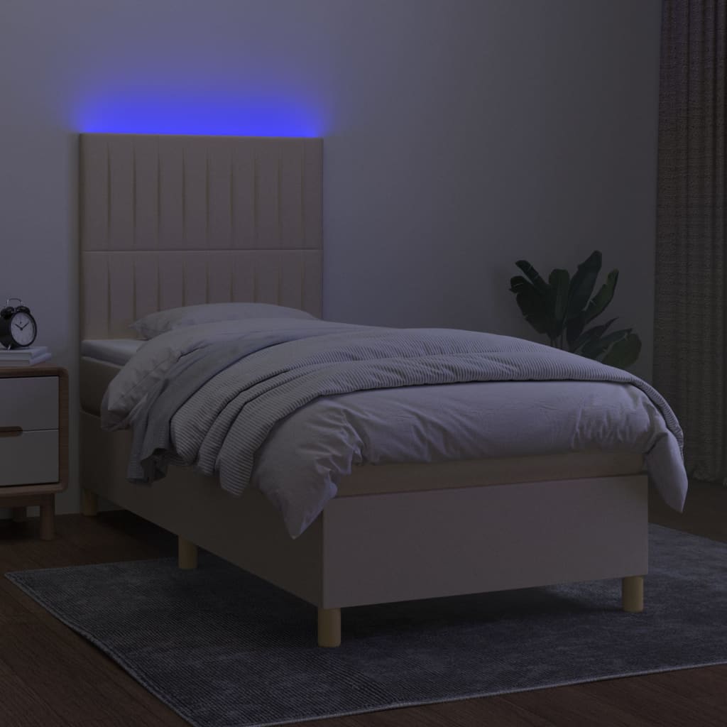 Box spring postel s matrací a LED krémová 90x200 cm textil