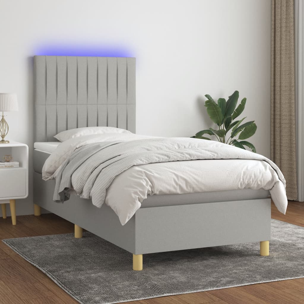 Világosszürke szövet rugós és LED-es ágy matraccal 100x200 cm 