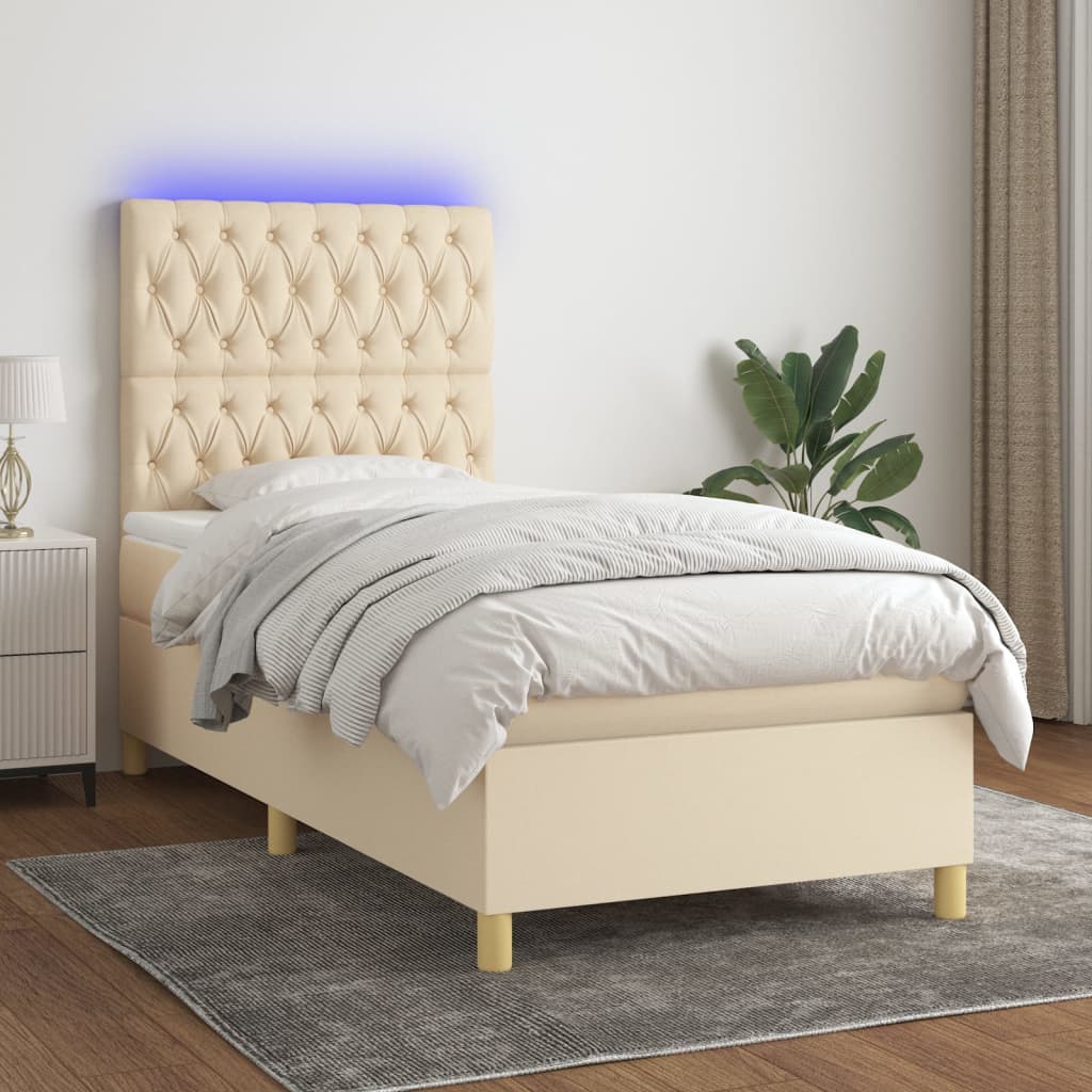 Box spring postel s matrací a LED krémová 90x200 cm textil