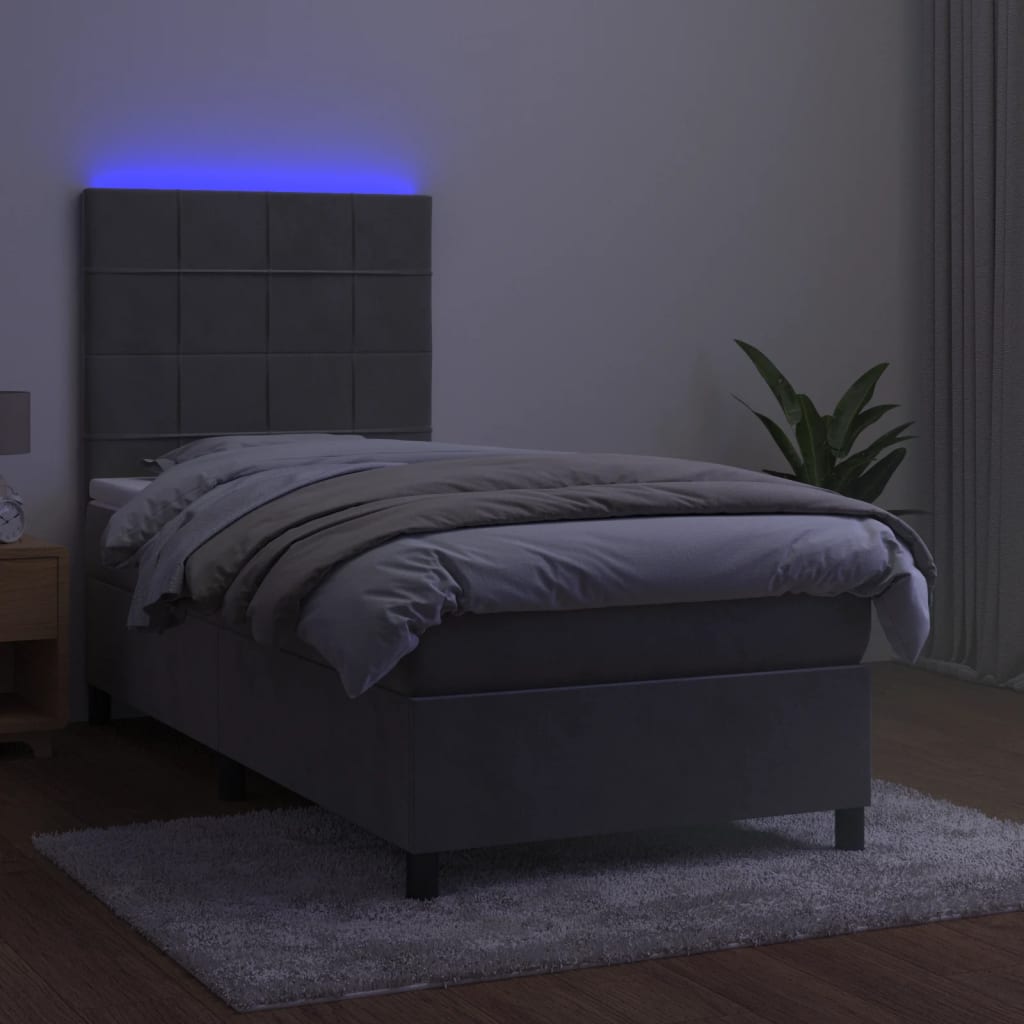 Box spring postel s matrací a LED světle šedá 90x200 cm samet