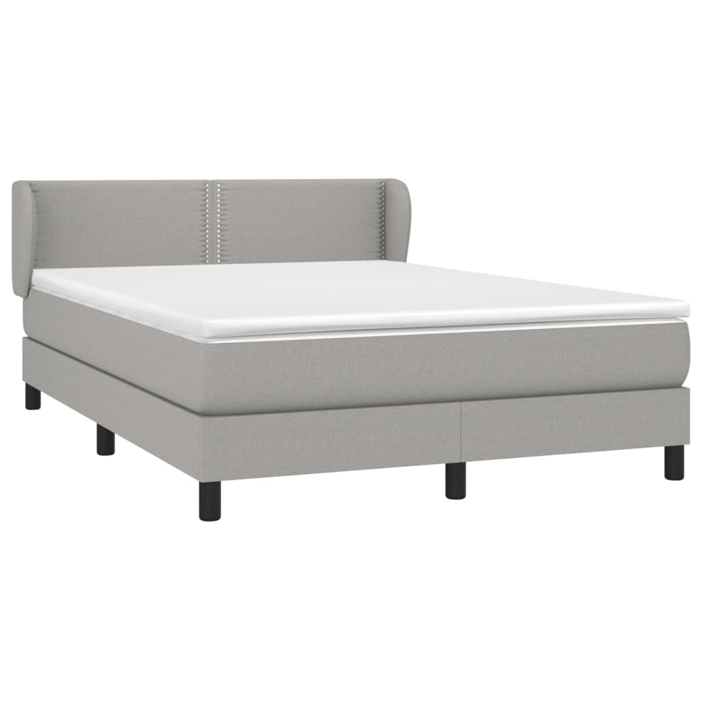 Box spring postelja z vzmetnico svetlo siva 140x200 cm blago