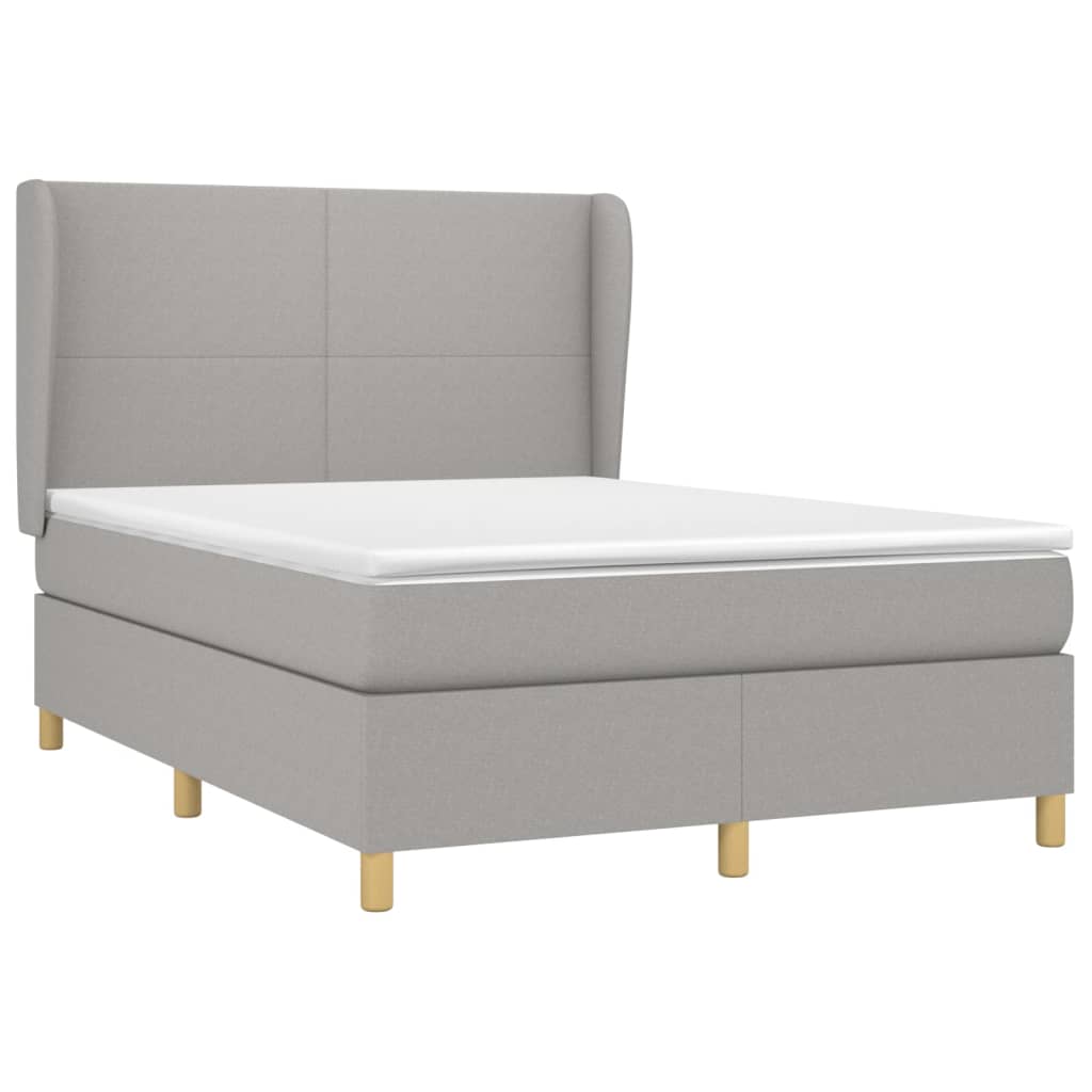 Box spring postelja z vzmetnico svetlo siva 140x200 cm blago