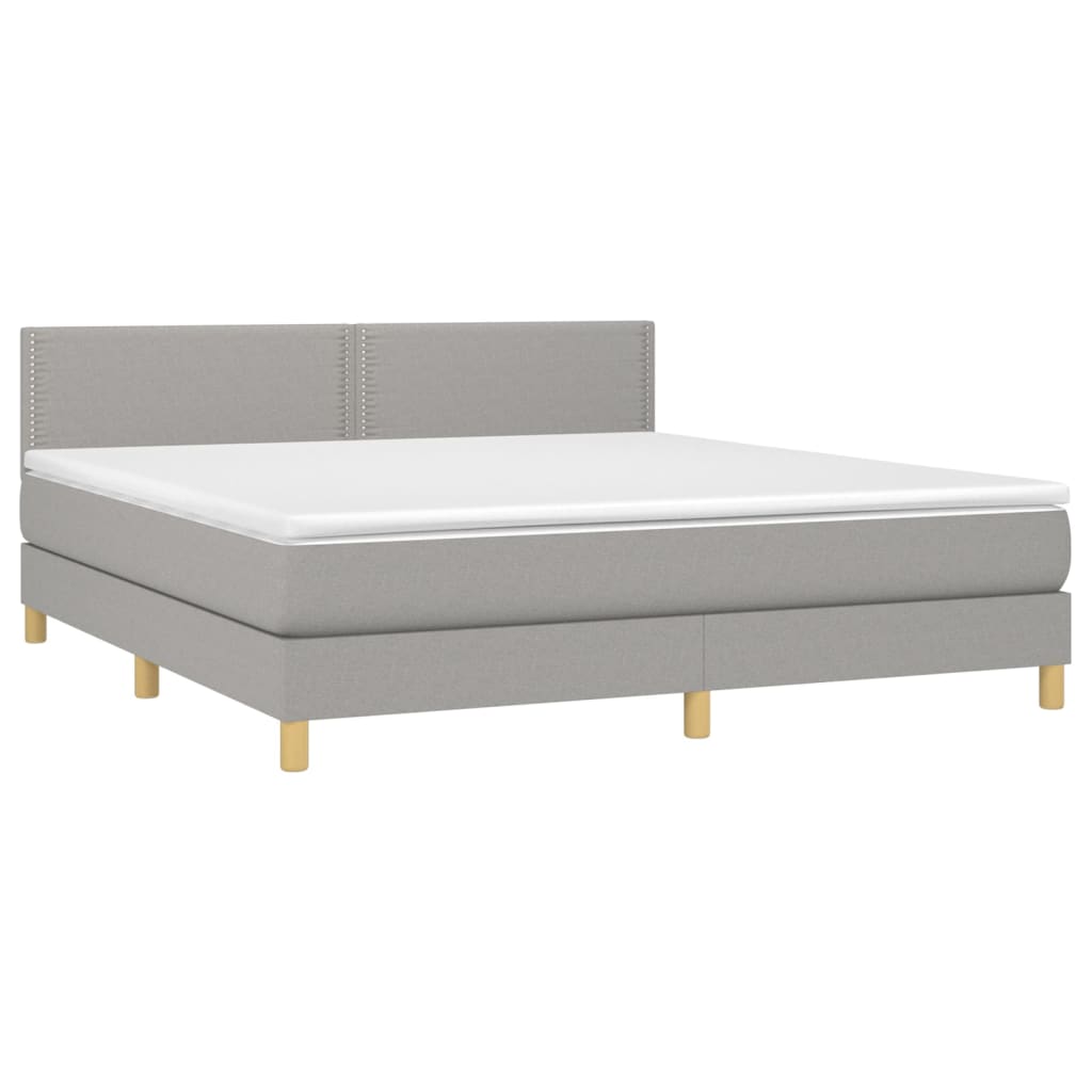 Box spring postelja z vzmetnico svetlo siva 180x200 cm blago