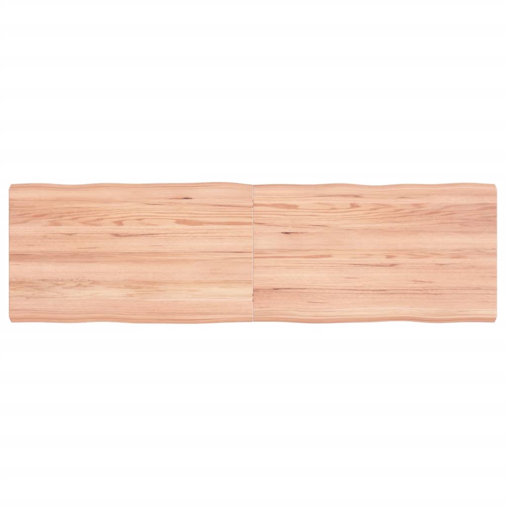 vidaXL Stolní deska hnědá 140x40x(2-4)cm ošetřený dřevo živá hrana