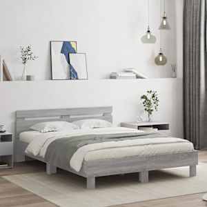 Posteljni okvir z vzglavjem siva sonoma 140x200 cm inž. les