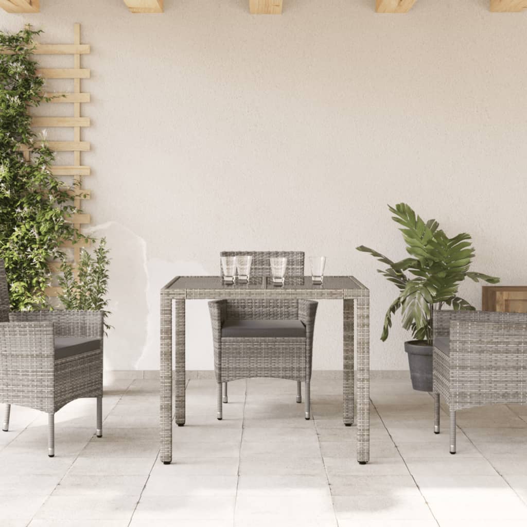 vidaXL Puutarhapöytä lasilevyllä harmaa 90x90x75 cm polyrottinki