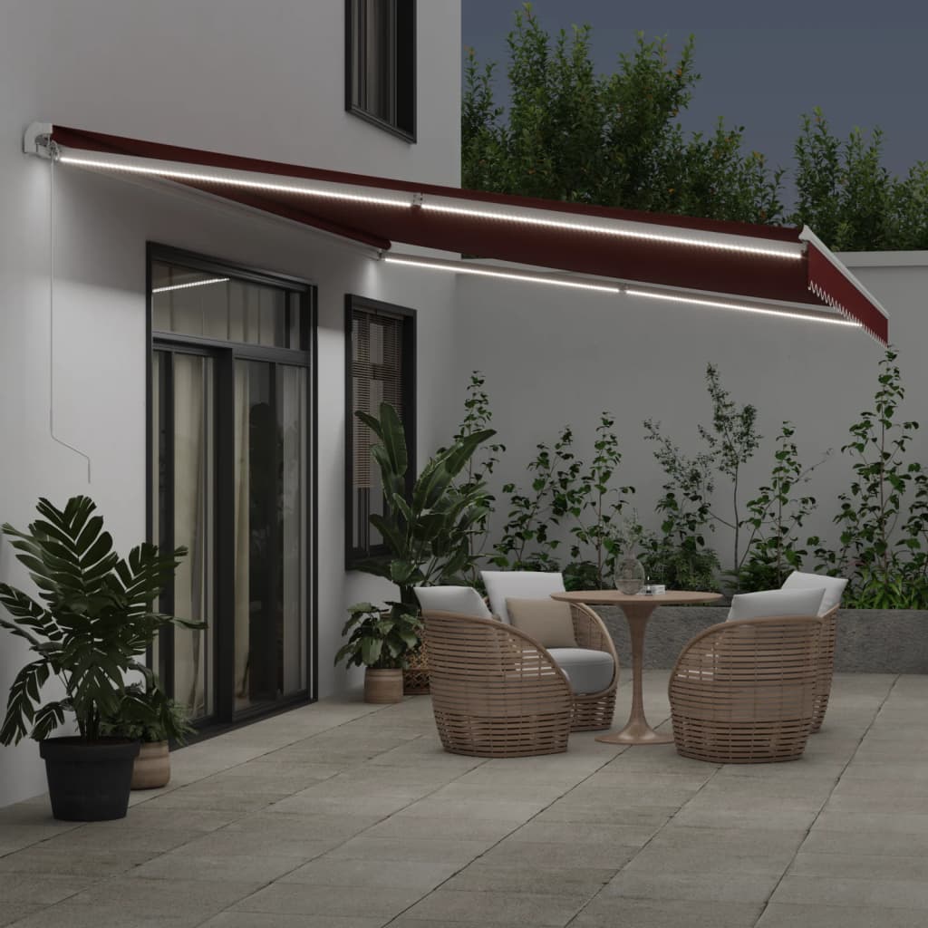 vidaXL Luifel handmatig uittrekbaar met LED 600x300 cm bordeauxrood afbeelding