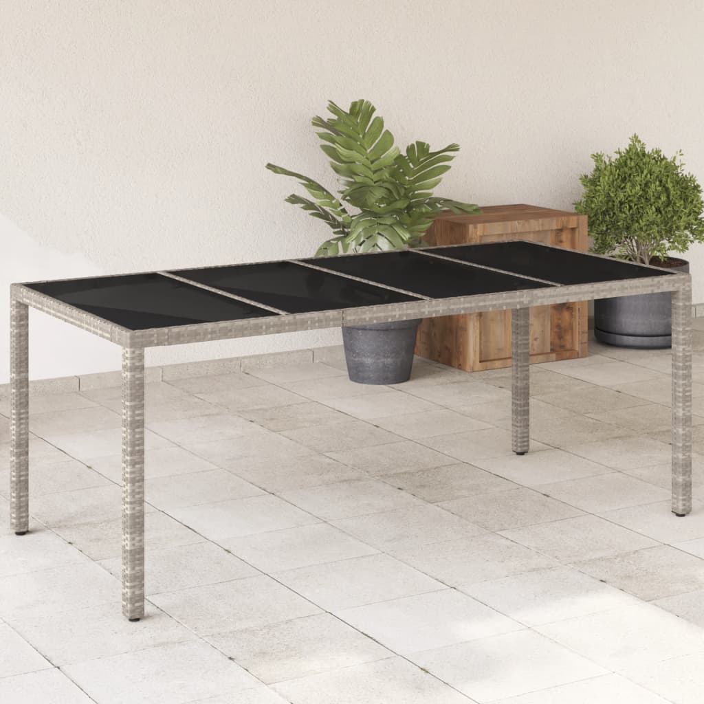 vidaXL Table de jardin dessus en verre gris clair résine tressée