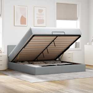 Otomanska postelja z vzmetnico siv 160x200 cm blago