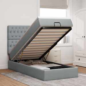 Otomanski posteljni okvir z vzmetnico siv 80x200 cm blago