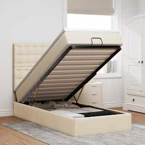 Otomanski posteljni okvir z vzmetnico krem 90x190 cm blago